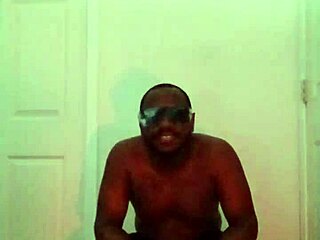 She dances on the balcony, exploring her anal canal with every move.