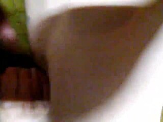 Can you believe this redhead sucking that monster cock?