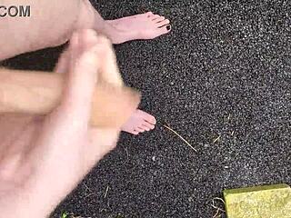 risky outdoor masturbation with monster cock at midday