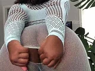 Joanfantasy teases with creamy pussy play in light blue lingerie, using a dildo for solo fun.