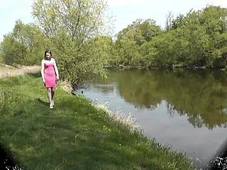 Sweet brunette girl performs solo in music video.