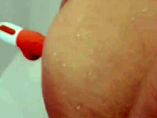 i caught my wife using her big dildo in the shower