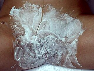 watch as i shave my hairy pussy up close using a trimmer and razor by the pool