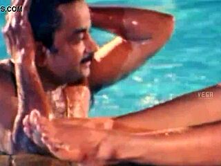 Unmarried hot couple enjoying at the swim pool