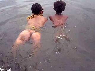 Two lesbians bathe in river!