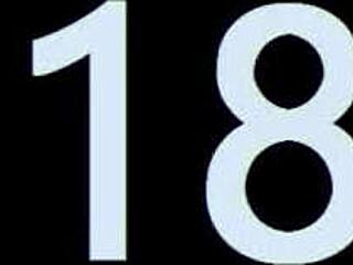 darkhair with big nipples on ottoman. Close-up view.