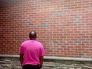 Enjoy a private strip tease for free, facing backwards in 70 degree weather.