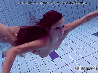 Lucy strips off bikini in pool underwater