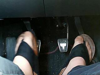 Nylon-clad feet with toe separators tease seductively in the car