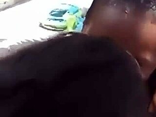 two liberian lesbos making out in an uncompleted building