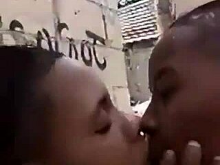 two liberian lesbos making out in an uncompleted building