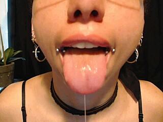 putting on nude colored lipstick and drooling all over it