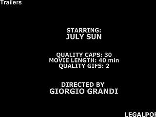 Slim slut July Sunn takes Mike Chapman's monster black cock.