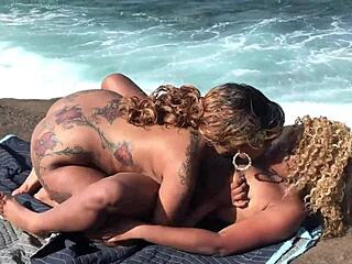 nina rivera and porsha carrera are having steamy lesbian sex on the beach, licking juicy pussies