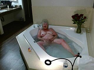 Mature woman in hotel jacuzzi gives jerk off instructions with dirty talk and cum