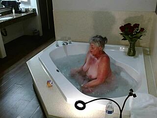 Mature woman in hotel jacuzzi gives jerk off instructions with dirty talk and cum