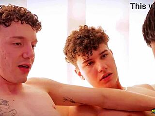 Daddy eats two twink cocks in gay threesome!