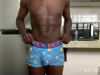 ebony guy plays with lube in the kitchen and has a huge cum explosion