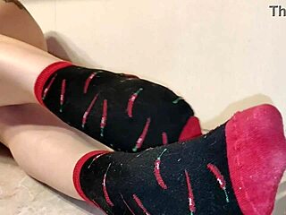 Detailed jerk-off instructions from housewife in kitchen, teasing with striped panties, smelly socks, washing feet in sink, showing wet pussy upskirt.