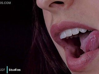 karly, the cute domme, dominates with mouth tests, sucking and kissing during bdsm massage