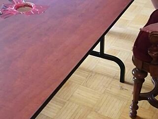 she stomps cum out of his huge cock on the desk