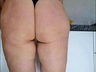 Hidden camera catches stepmother in kitchen in just panties and see-through blouse