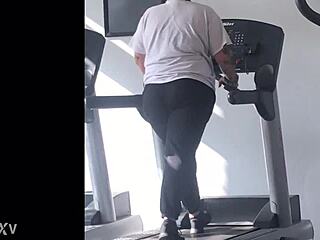 Big booty girl works out on the treadmill