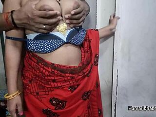 Indian Desi Bhabhi With Big Boobs In Red Saree Gets Intimate.