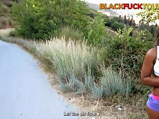 Black amateur teen 18+ kneels sucking massive white cock outdoors in public park