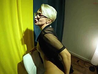 hey, check out this horny mature blonde in glasses working her big ass with a dildo solo stockings close-up