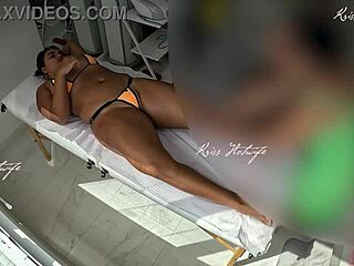 Micro bikini massage slips deep into her curves?