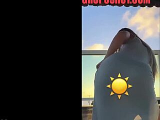 hot blonde dances seductively in sheer see-through dress