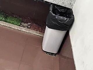 What lurks inside this public bathroom toilet stall? Solo amateur strokes small cock outdoors.