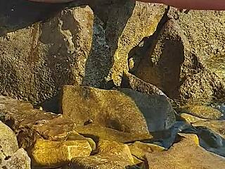 Suggestive sea breeze as Nina Black pees outdoors