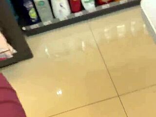 Asian Ladyboy Excitedly Shows New Thong in Store