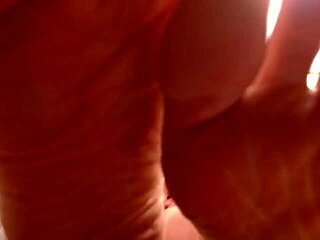 Retro Babe with Blue Eyes Smokes Cigarette Ignoring Feet in No Panties Scene