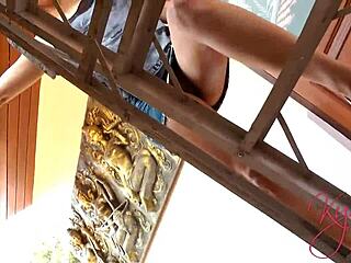 Redhead teen's miniskirt adventure on the roof top