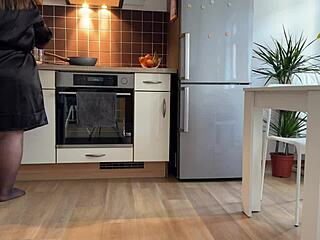 Mother-in-law rubs wet pussy in kitchen, gets cum on fat ass