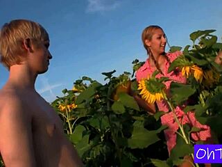 kitty and mark explore a sunflower field for their first college adventure together.