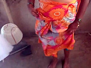 My housewife shows her big boobs in the village house