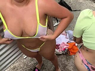 Sensual women caught on camera in beach dressing area intrigue viewers.