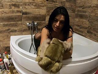 Heyy, watch milfycalla play with pee in bathtub wearing fur coat! 🛁