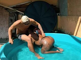 Mature blogger in the pool sits on black dildo for anal orgasm