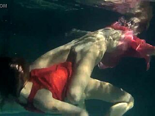 lilia mihalkova and natalia kupalka dive into steamy underwater lesbian play