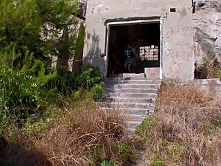 Flaming hot pink haired babe enjoys outdoor adventure with muscular man in bent over poses.