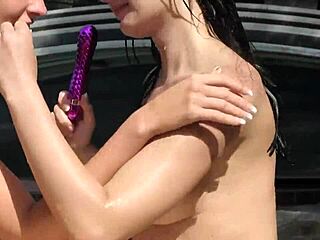 Playful lesbian teens finger and lick shaved pussies at pool