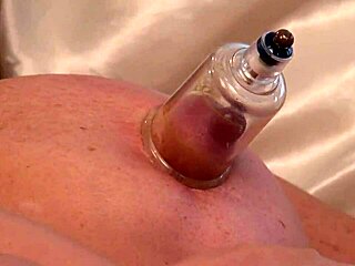 Mature Woman with Big Tits Sucks on Vibrating Cups