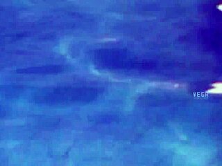 Unmarried hot couple enjoying at the swim pool