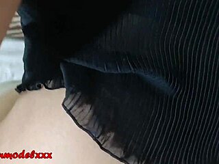 this pregnant hot model is posing in bed wearing a black babydoll