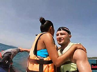 Asian girlfriend gives a blowjob in public on a jetski